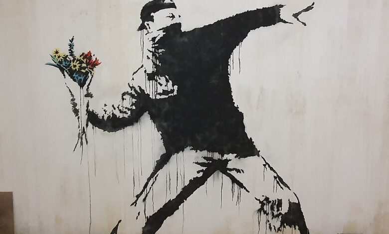 Banksy flower thrower palestina